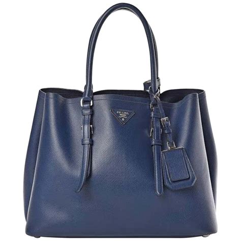 prada double handle tote saffiano cuir with accessories bluette|Prada leather bag.